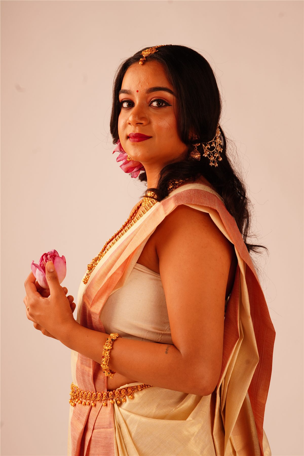 Cream and gold saree with lotus